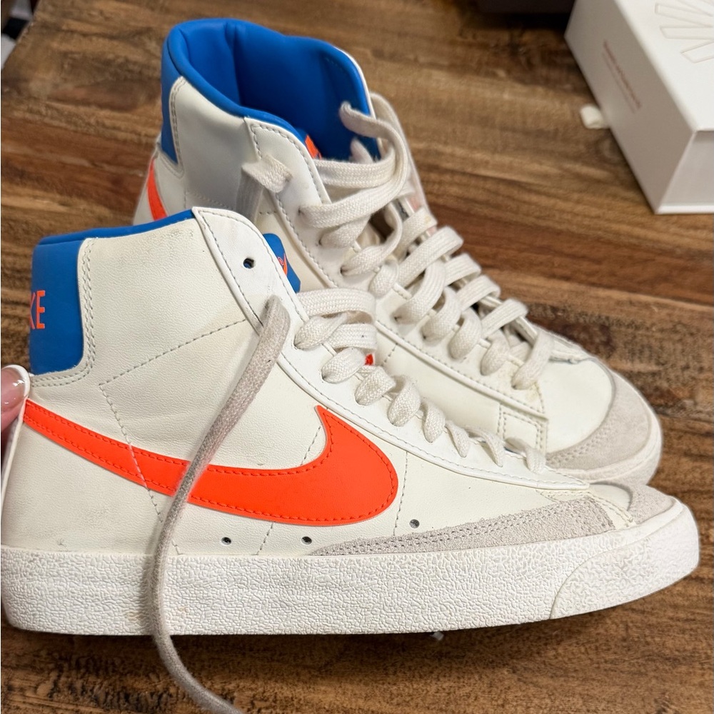 Nike Cream High-Tops with Orange and Blue Accents
